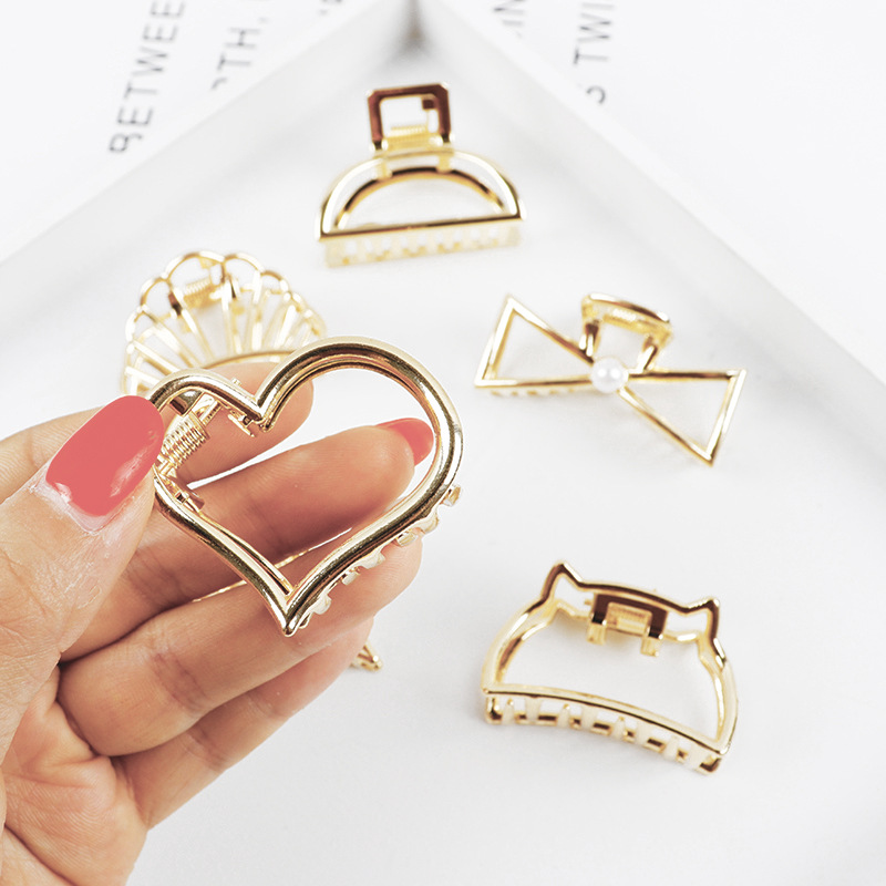 Kleine minimalistische haarkla - Gold 6138 recensie en prijs